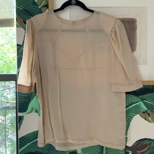 Cream colored silk blouse